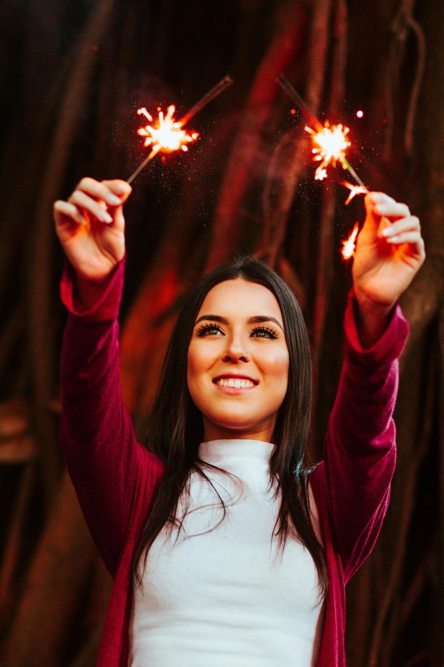 Person celebrating progress with confetti, representing motivation and success.