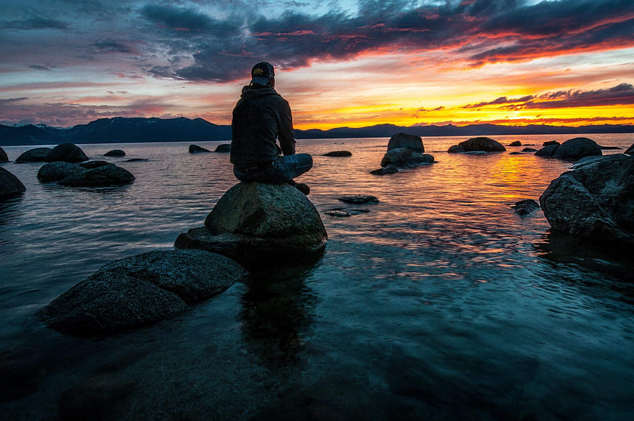 Person practicing mindfulness to stay calm and focused during difficult times.