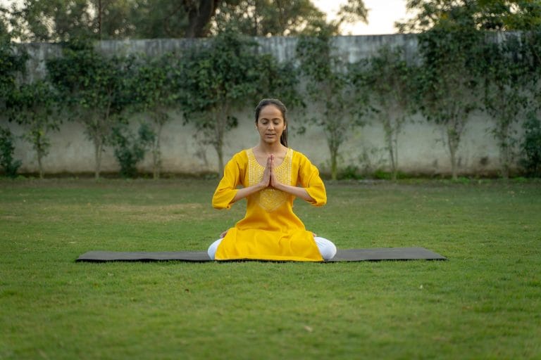 Person meditating to illustrate spiritual fear guiding personal growth.