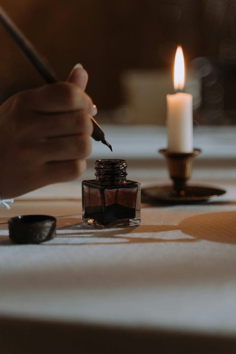 Open letter with quill and ink on desk, symbolizing American history.