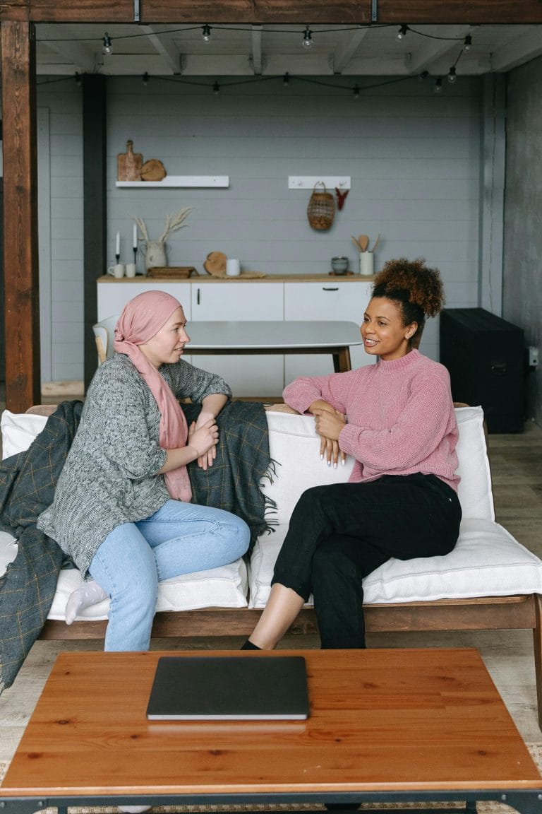 Two friends talking, representing how friendship empowers freedom.