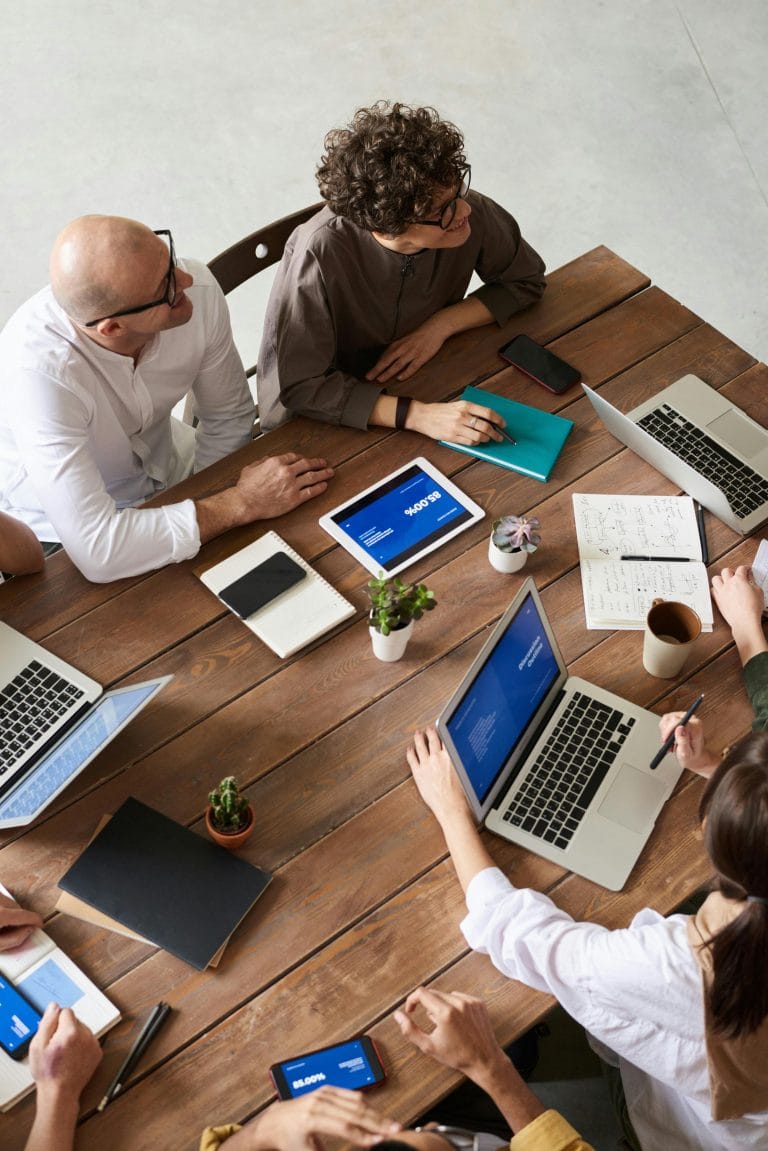 High angle photo of people brainstorming