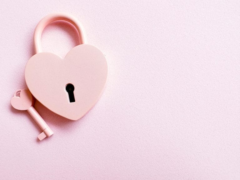 Heart-shaped key unlocking a brain, illustrating how love changes us.