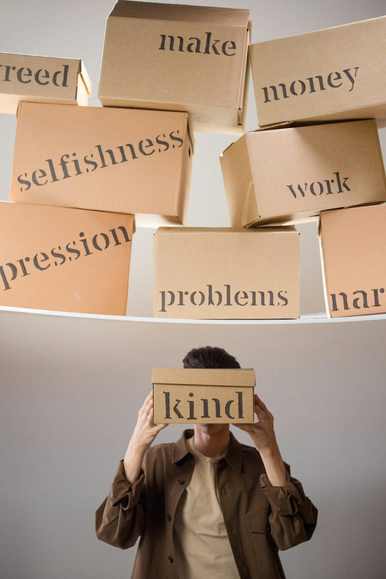 Man standing and shelf with boxes with problems