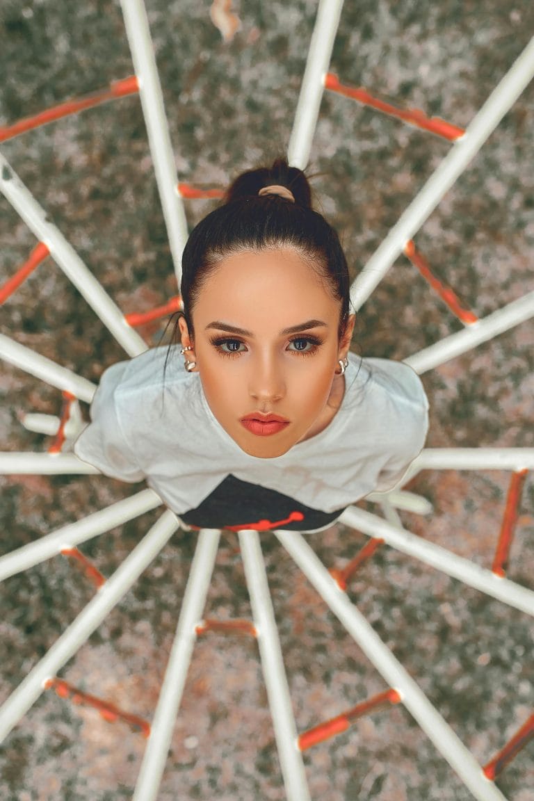 Close up photo of beautiful woman looking up