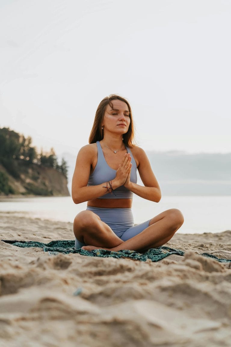 Hands in prayer symbolizing focus and emotional resilience for success.