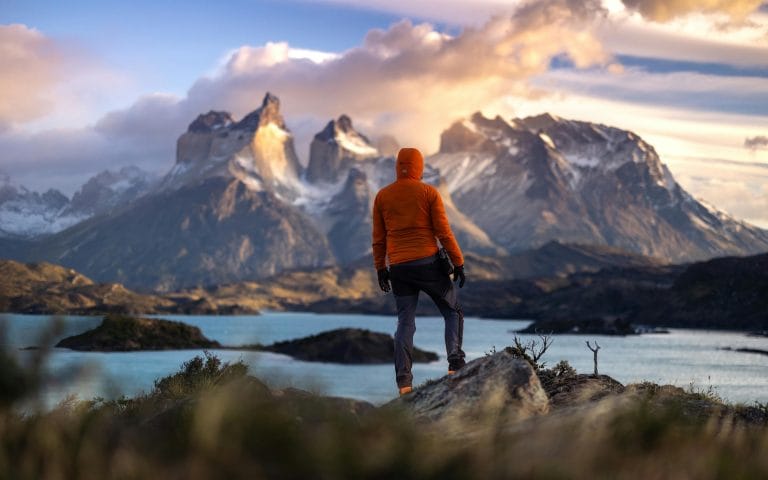 Person standing at a crossroads, ready to seize a crucial life moment