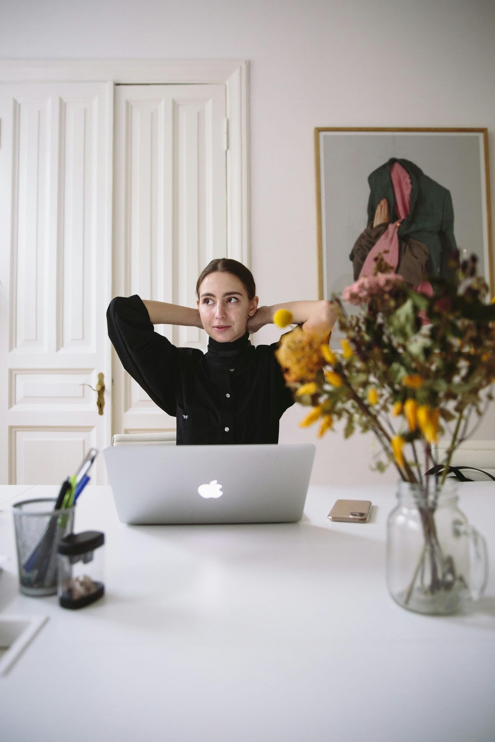 Person contemplating work break for mental well-being and productivity.