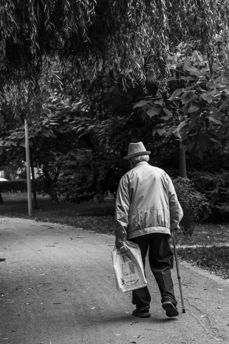 Person walking along a path symbolizing trusting the process for growth.