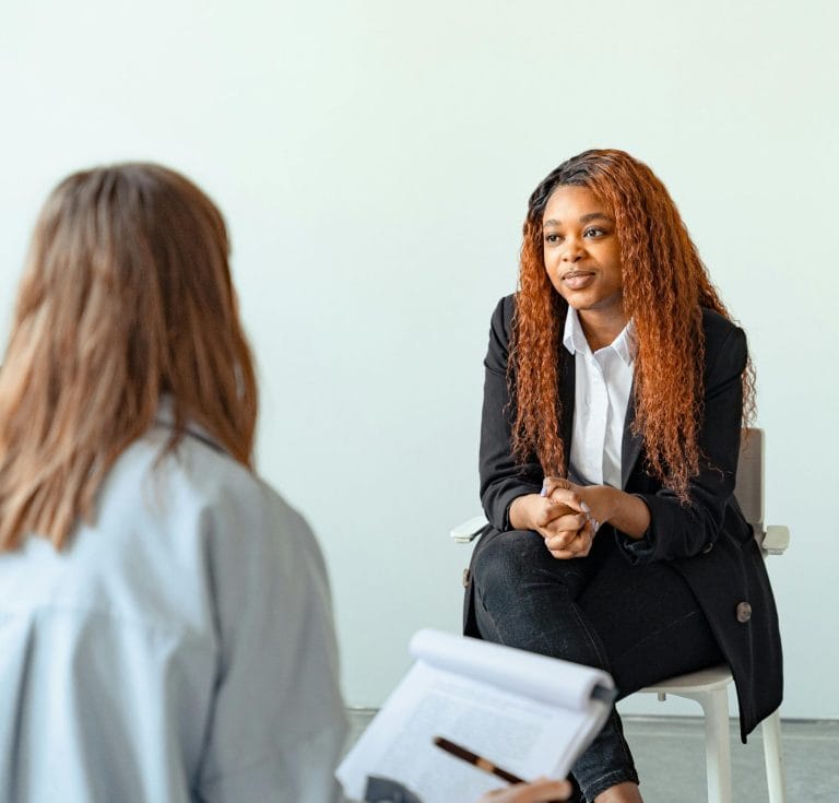 Therapist helping client develop resilience for emotional growth.