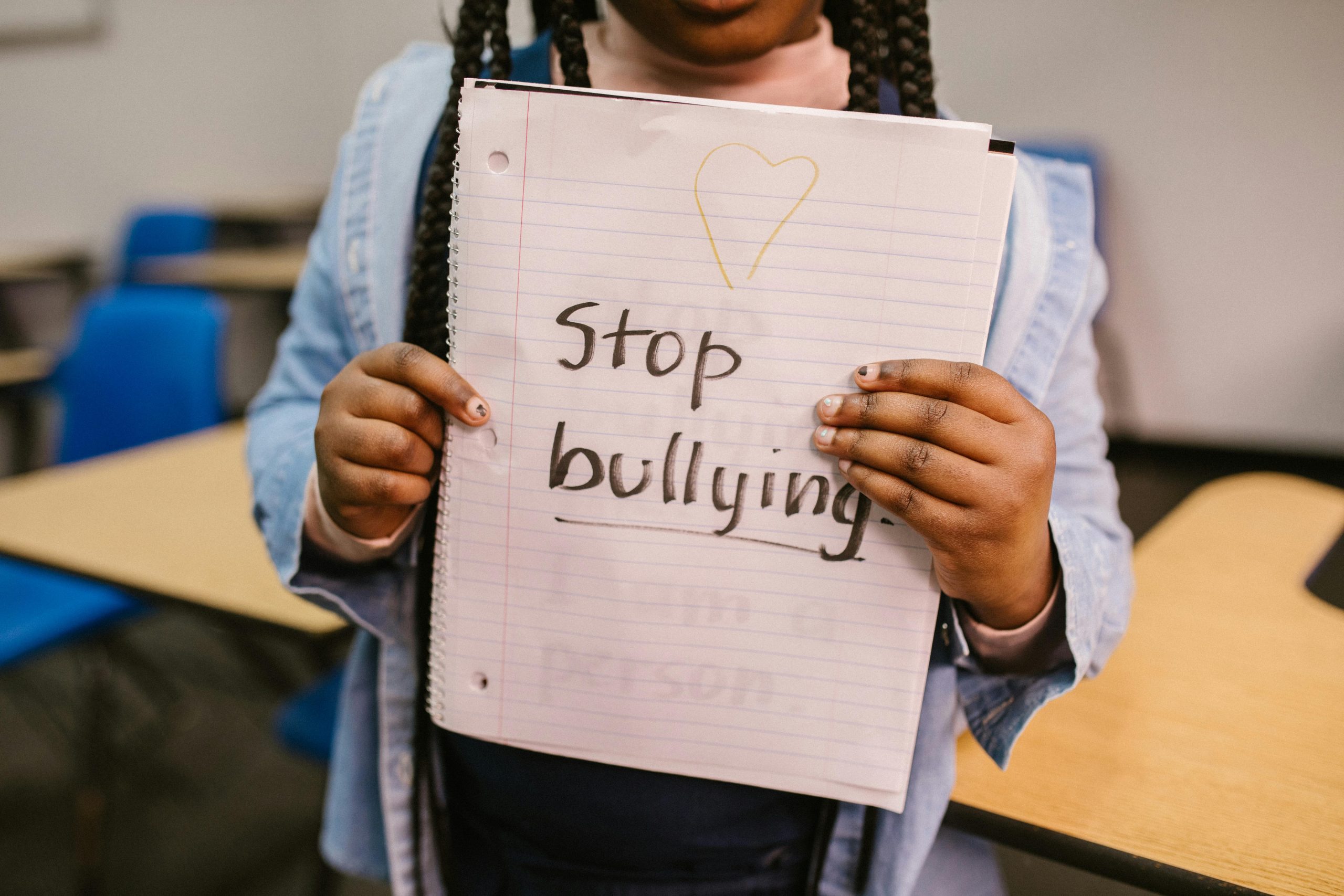 People collaborating in a safe, inclusive environment to promote anti-bullying programs.