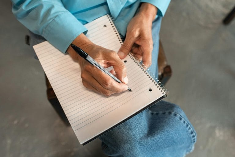 Notebook with gratitude prompts for positivity and self-reflection