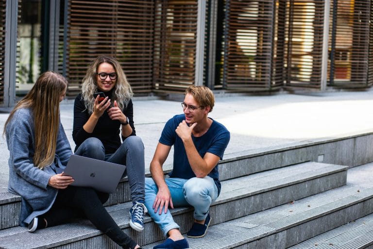 Confident person using rizz lines to connect in conversation